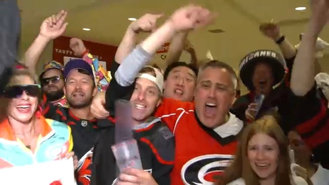 Canes fans celebrating